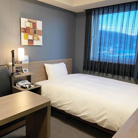 Hotel Route-Inn Yamagata Minami -Daigaku Byoin Mae- Bagian luar foto
