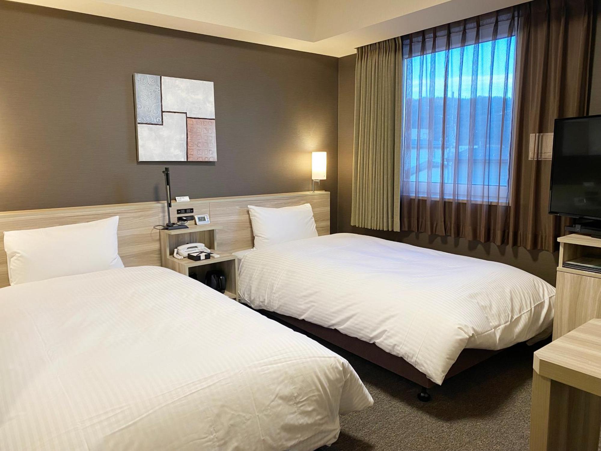 Hotel Route-Inn Yamagata Minami -Daigaku Byoin Mae- Bagian luar foto